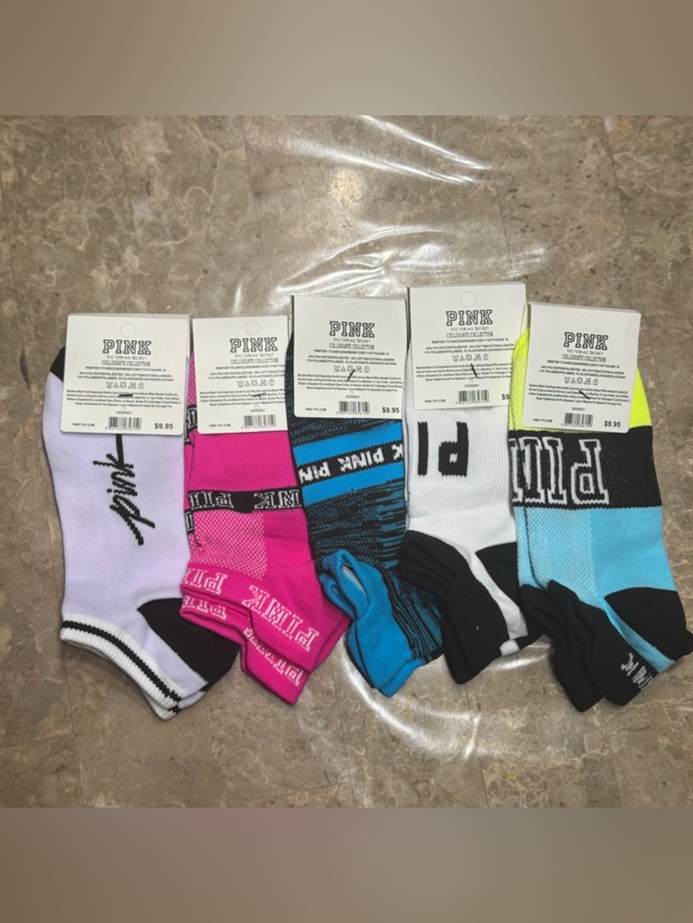 New Pink Victoria’s Secret Socks
With tags 
New Pink socks 
5 pairs included